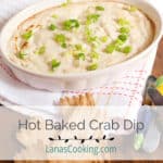 Crab dip in a baking dish with crackers on the side.
