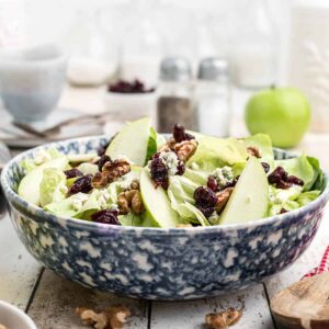 Finished salad in a decorative bowl.