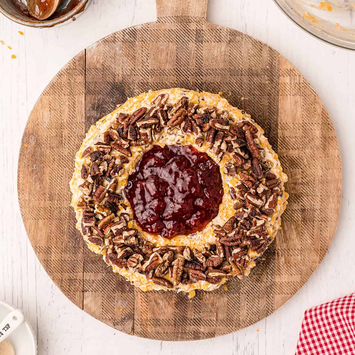 Cheese ring with preserves and pecans added.