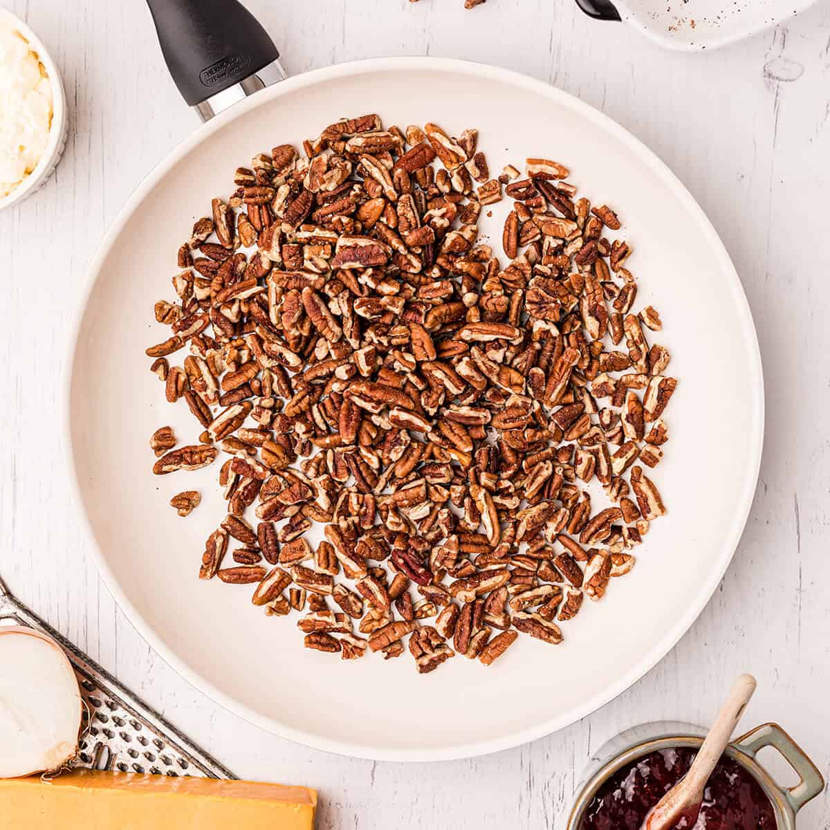 Toasted pecans in a dry skillet.