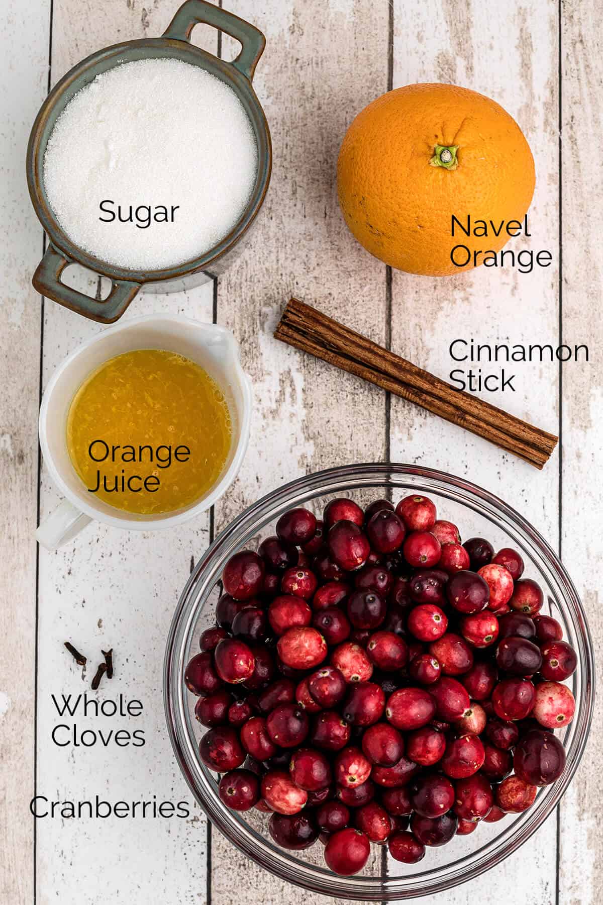 All ingredients needed to make cranberry orange sauce.