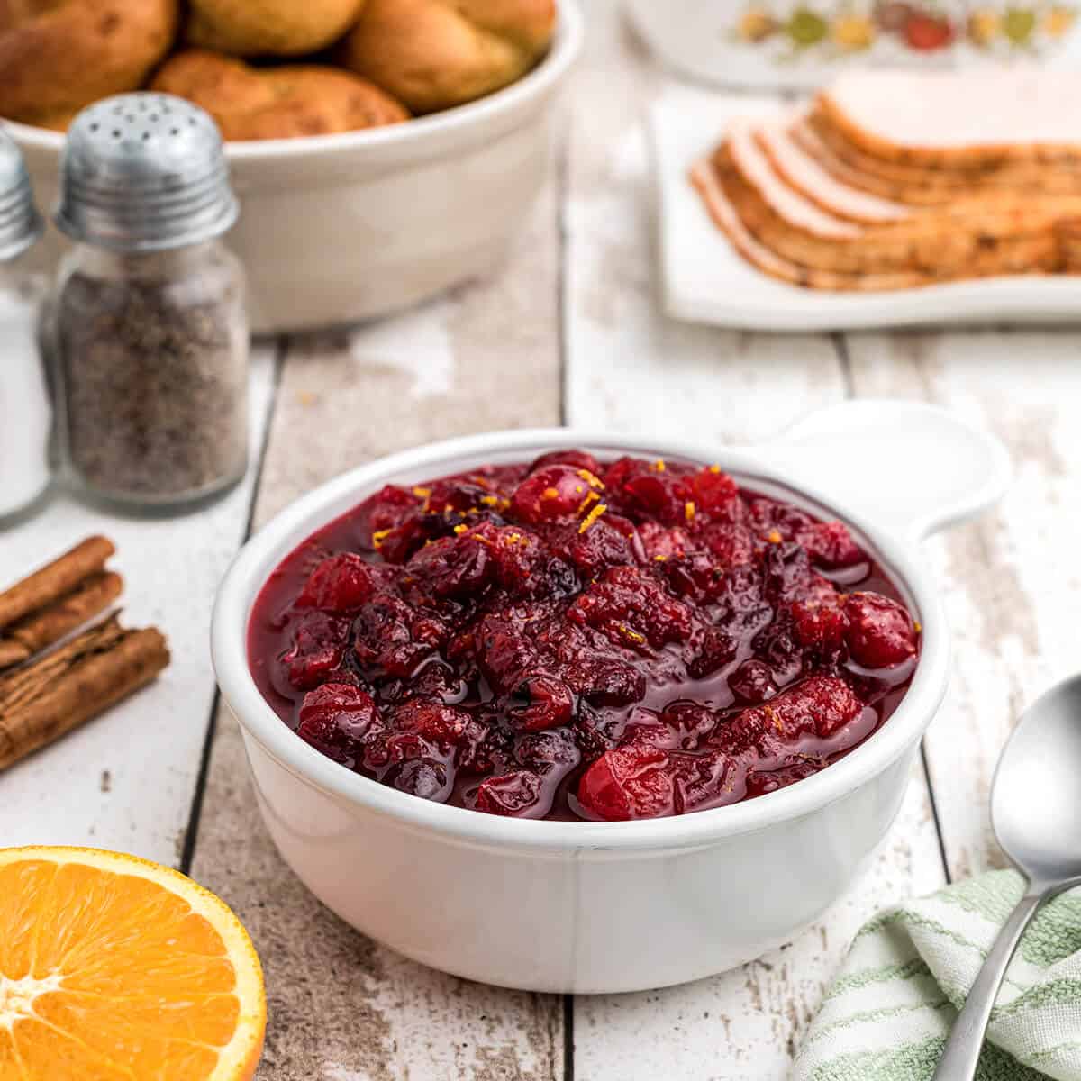 Cranberry orange sauce in a white serving dish.