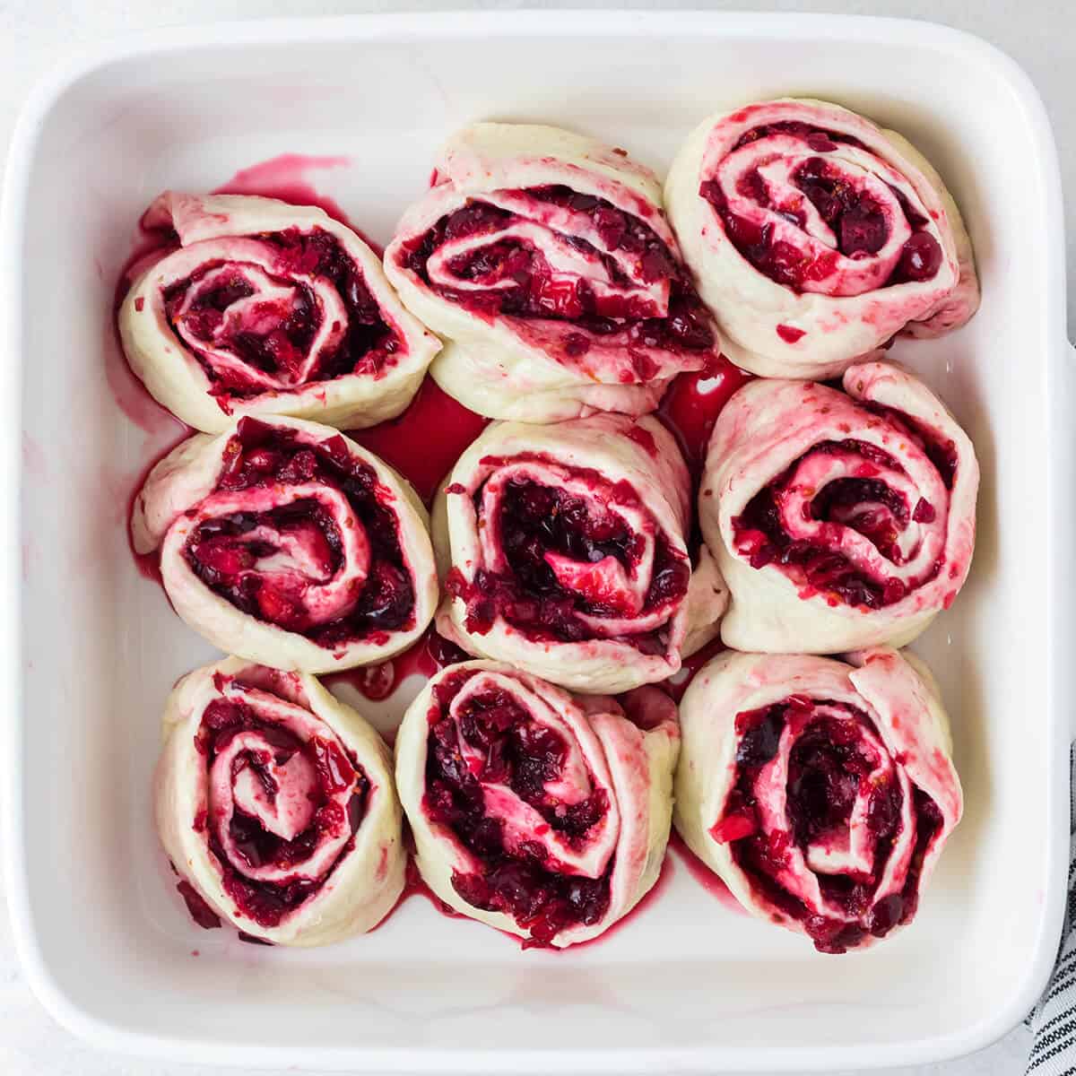 Cut rolls in a baking dish.
