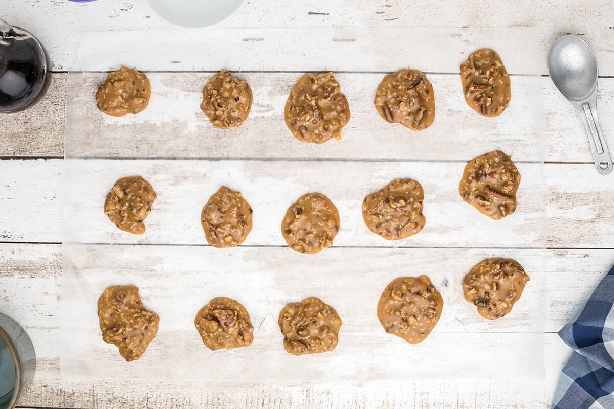 Pralines dropped onto waxed paper.