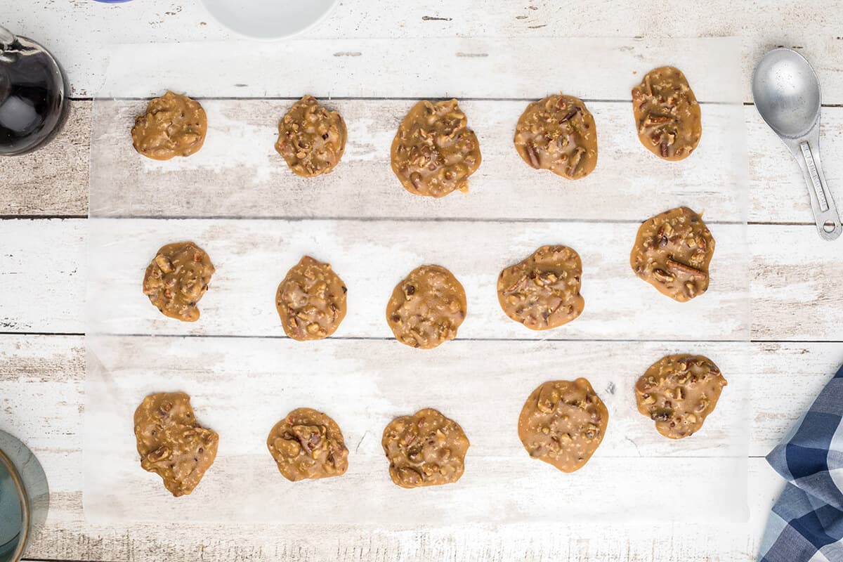 Pralines dropped onto waxed paper.