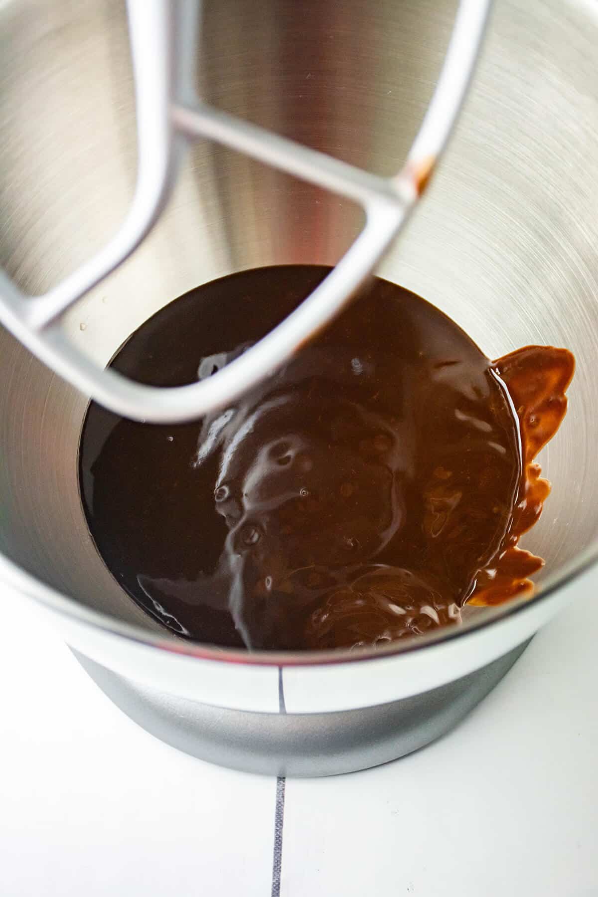 Melted chocolate in mixing bowl.