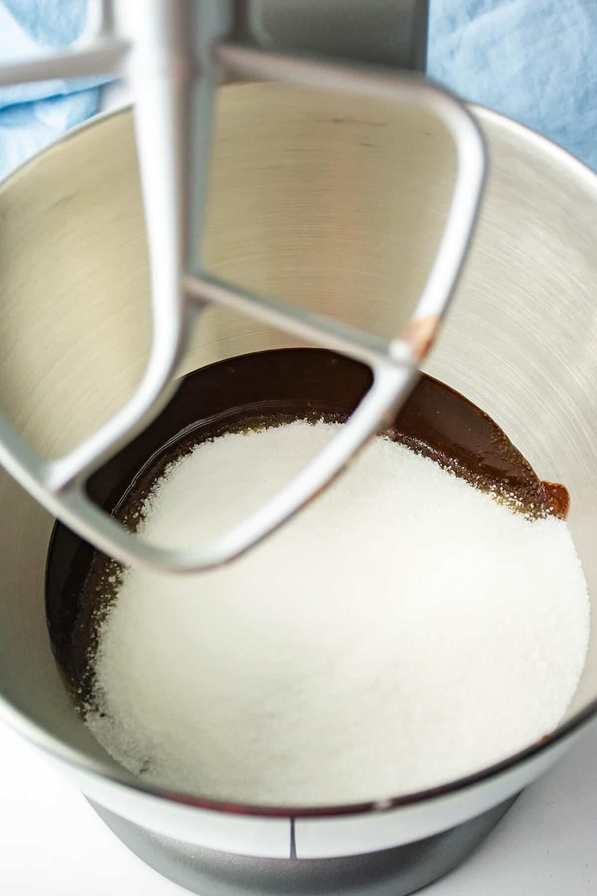 Sugar added to melted chocolate.