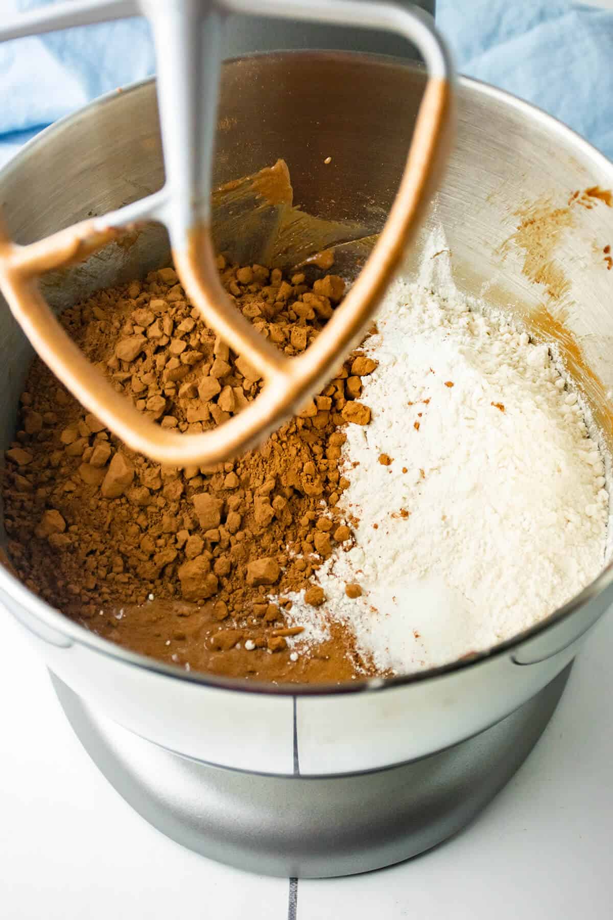 Cocoa powder and flour added to chocolate mixture.