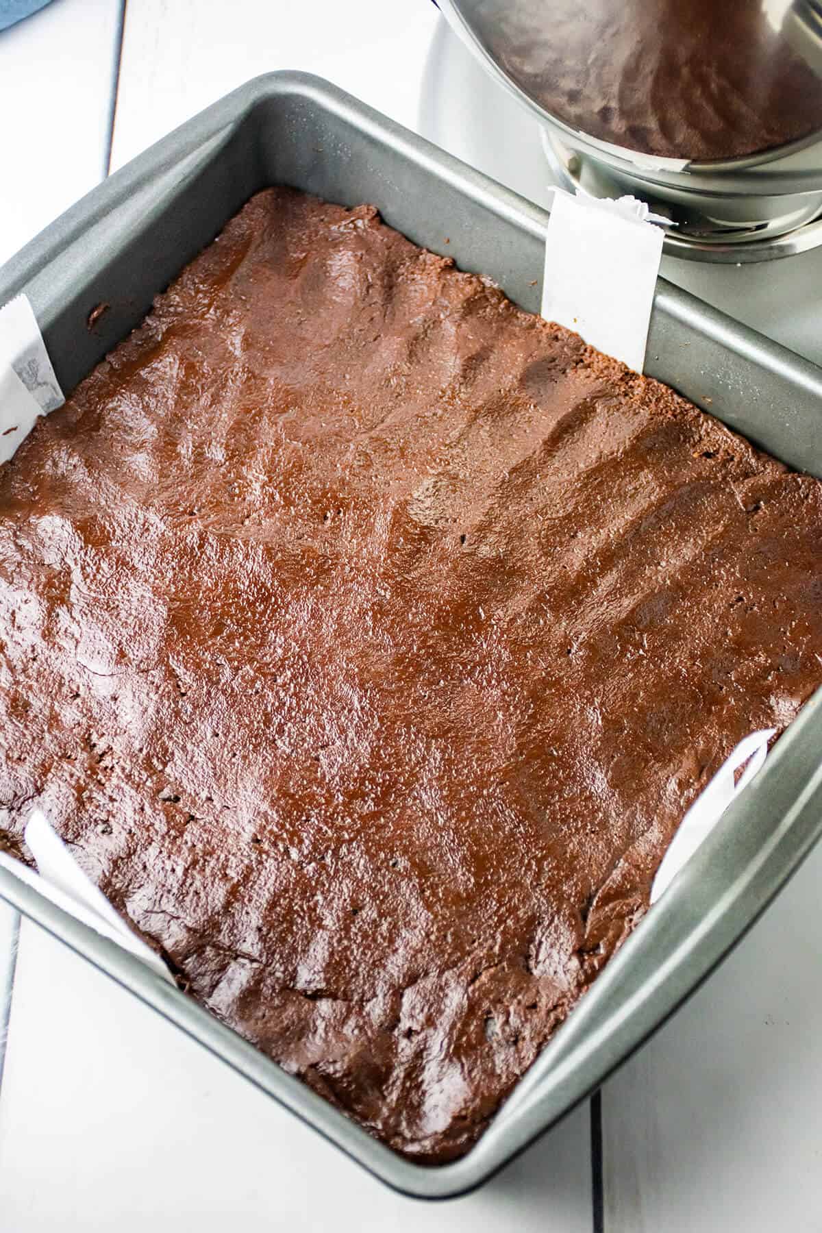 Brownie mixture pressed into prepared pan.