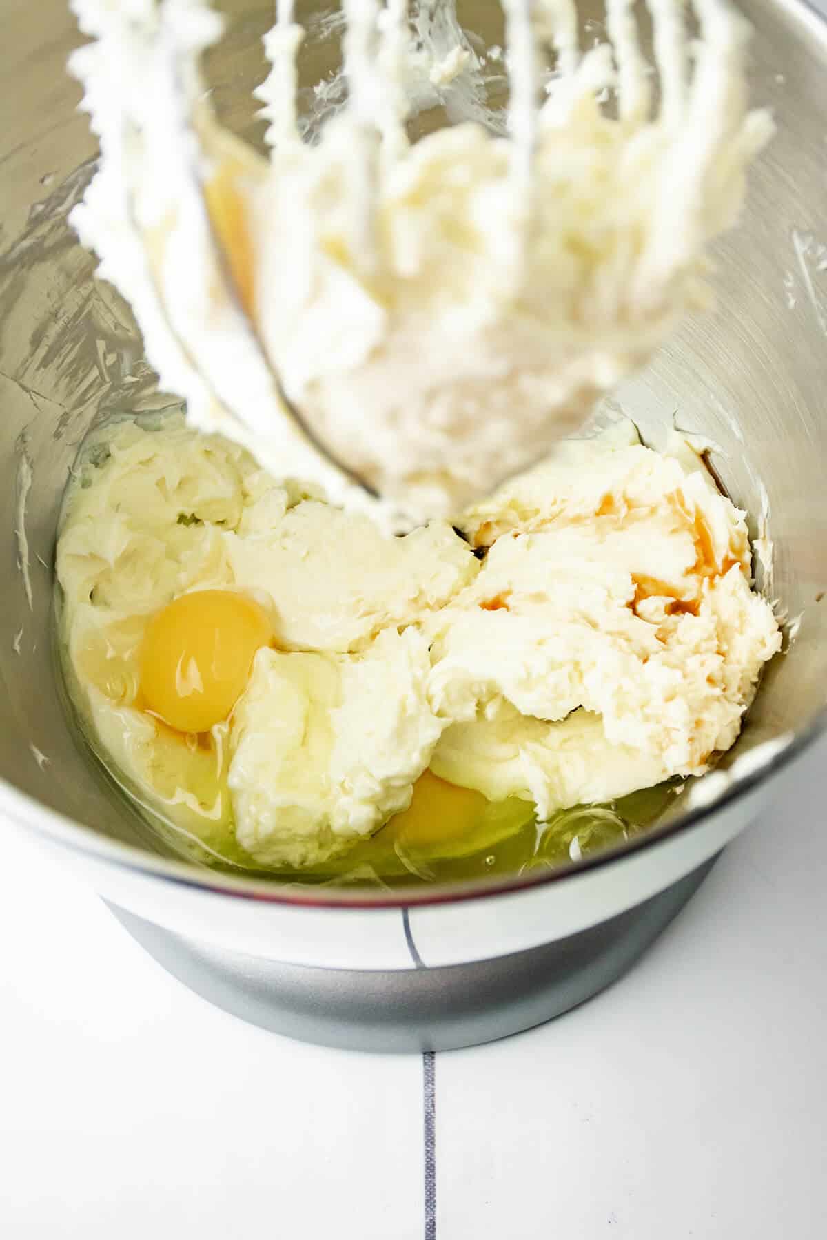 Eggs and vanilla added to cream cheese mixture.
