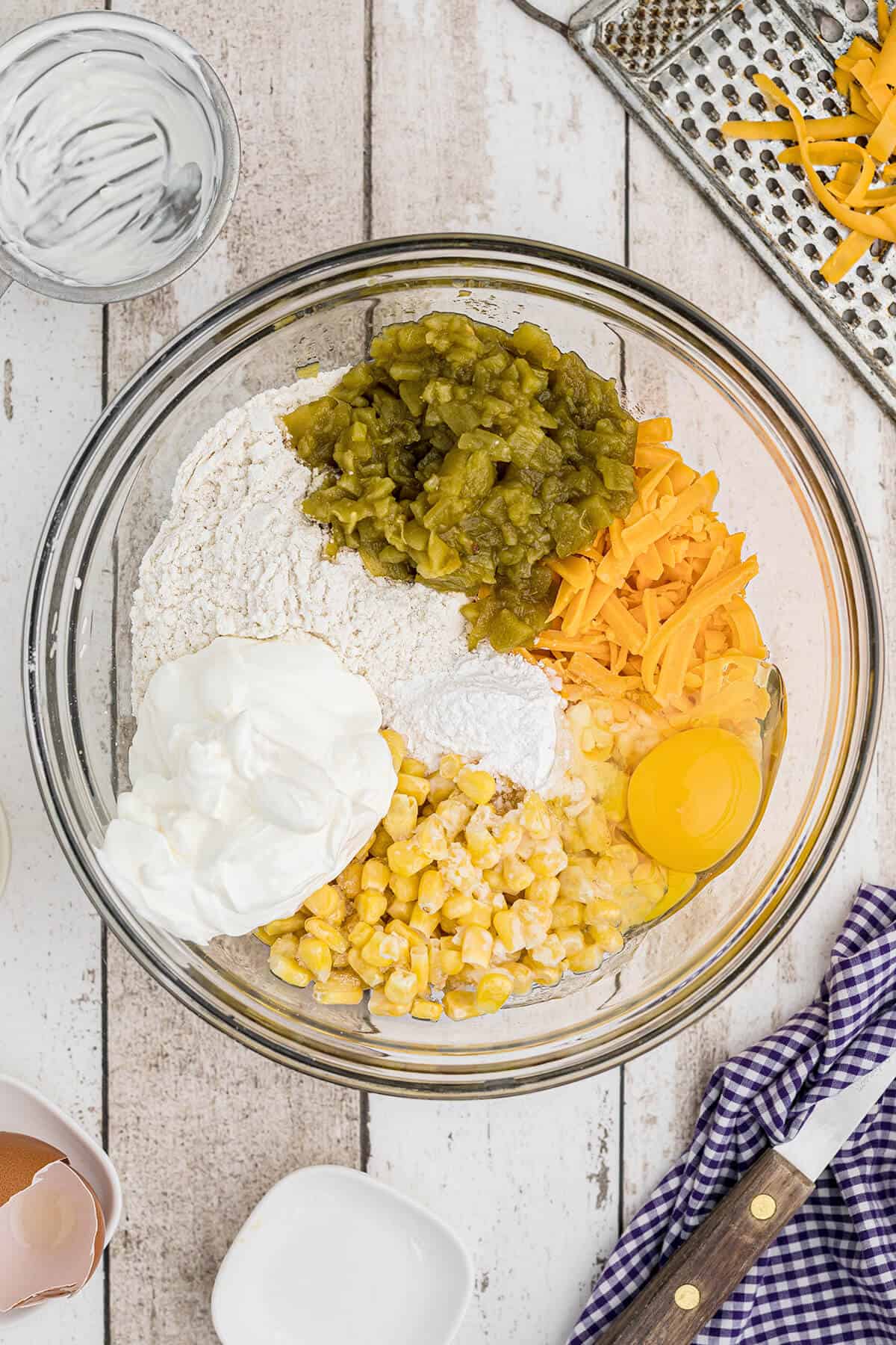 All cornbread ingredients in a mixing bowl.