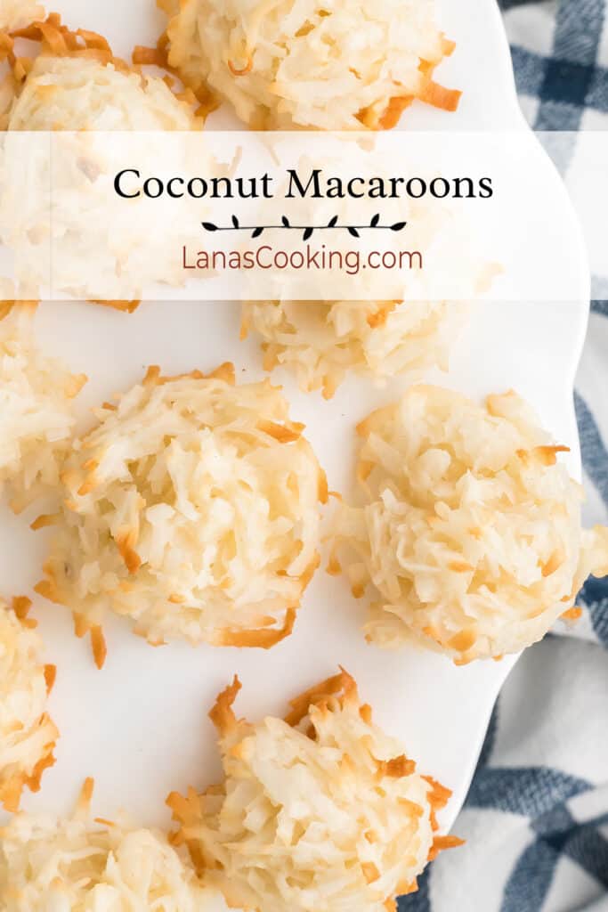 Coconut macaroons on a white pedestal.