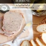Slices of French country terrine with bread, pickles, and mustard on a wooden board and white cloth.