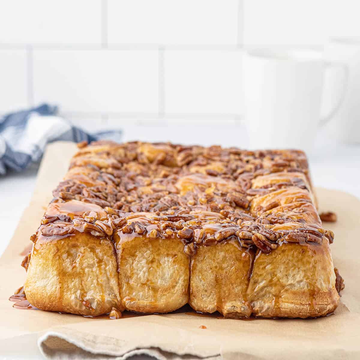 Sticky buns turned out onto parchment paper.