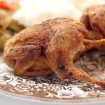 Fried quail on a vintage dinner plate.