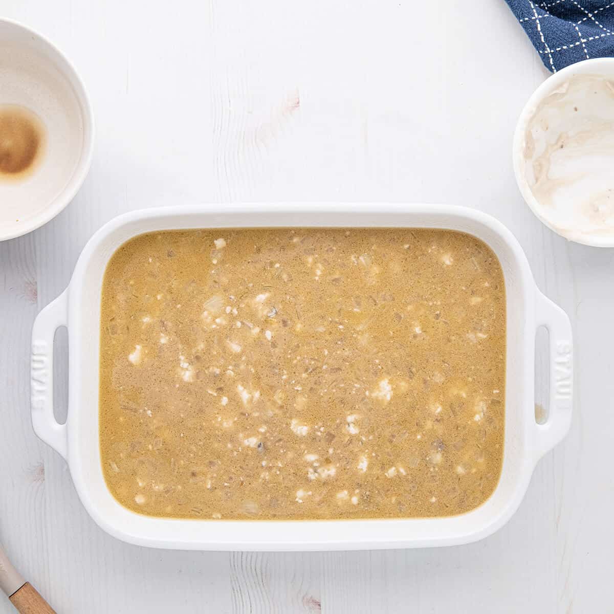 All ingredients mixed in a baking dish.