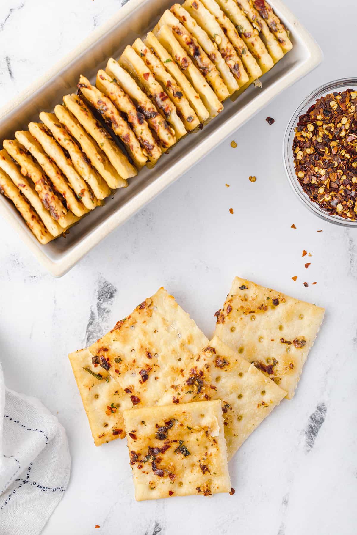 Finished crackers in a white serving dish.