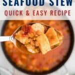 A spoonful of seafood stew with shrimp, fish, and vegetables is held above a pot of stew. Text on the image reads: Seafood Stew Quick & Easy Recipe and lanascooking.com.