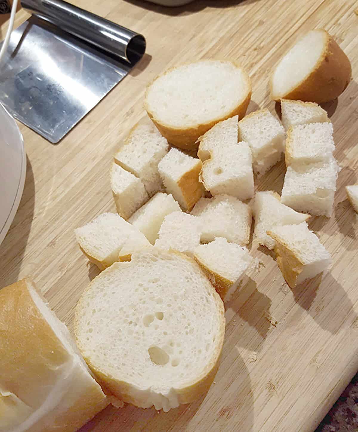 Cut bread on a wooden board.