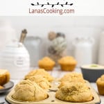 Finished muffins in a baking tin.
