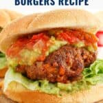 Close-up of a taco-seasoned burger with lettuce, guacamole, and salsa on a bun, with text overlay for a recipe.