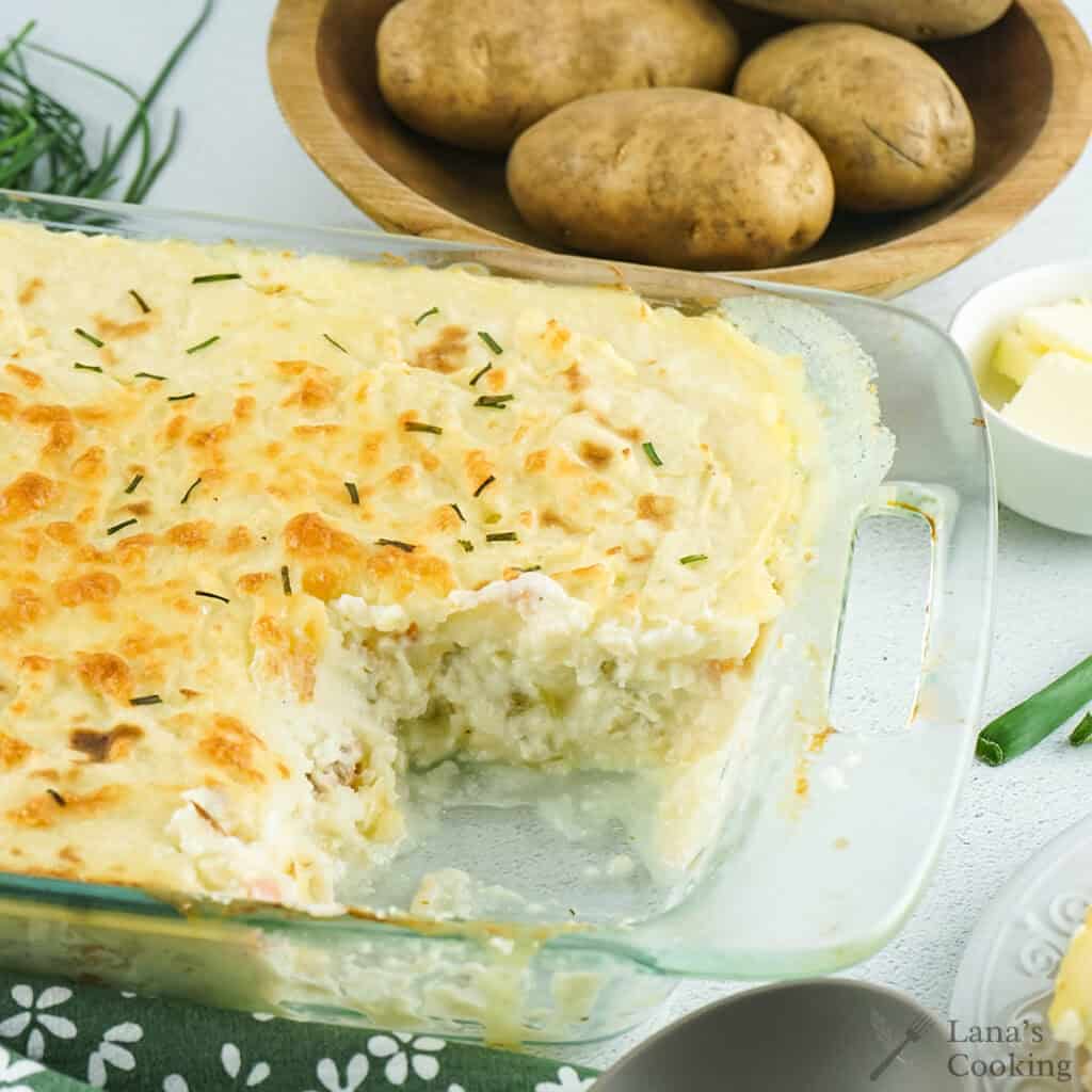 Finished fish pie in a casserole dish.