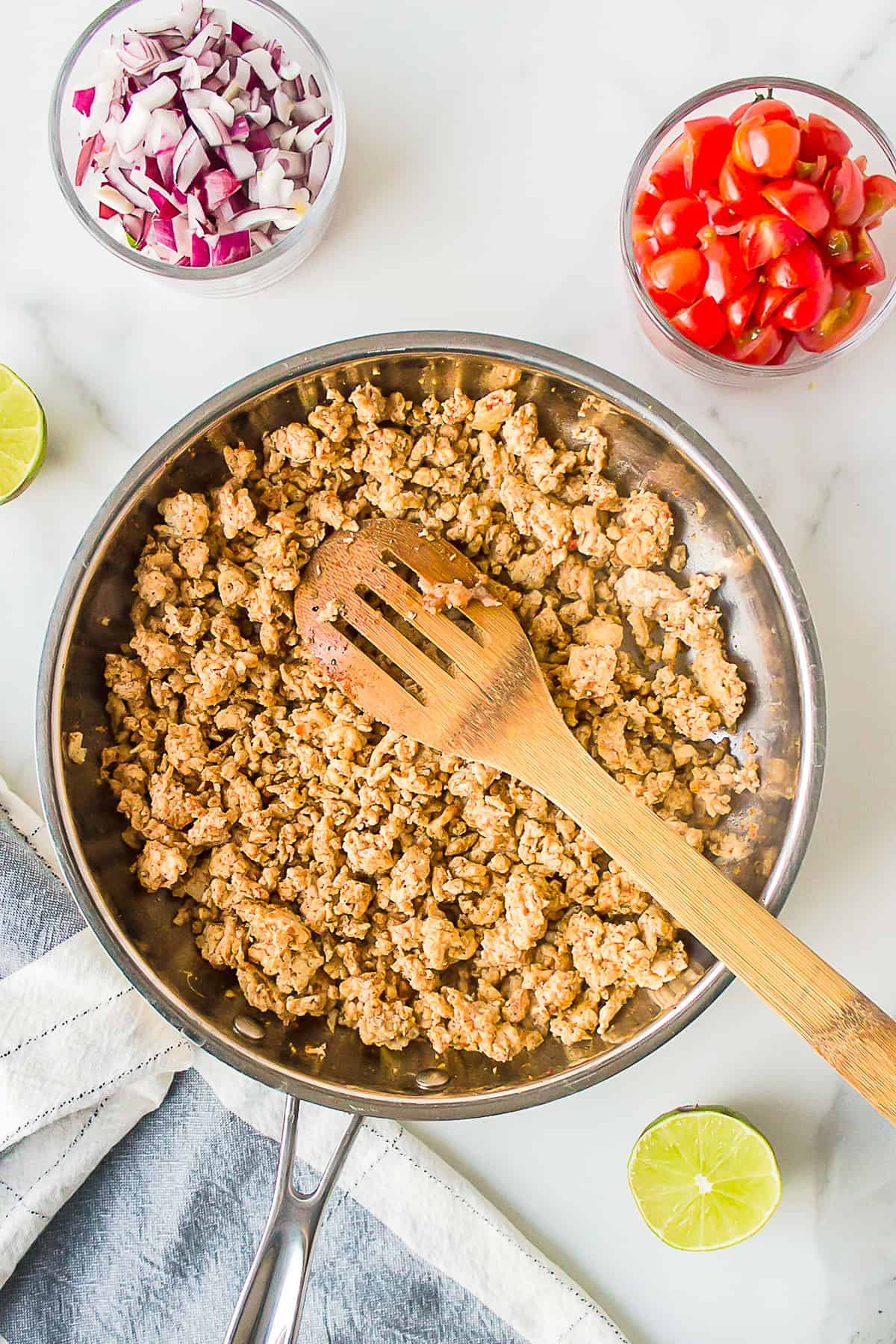 Cooked, seasoned ground turkey in a skillet.