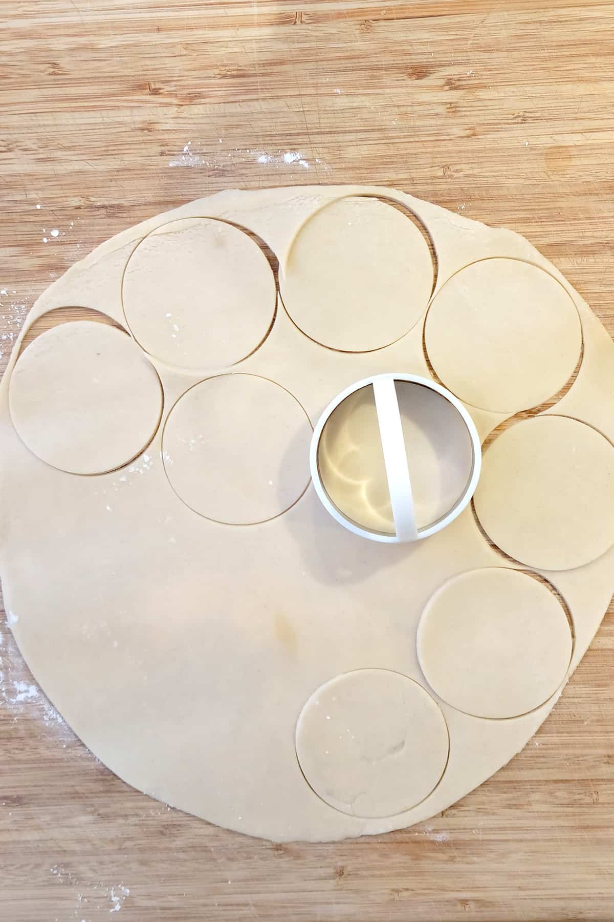 Cutting circles with a biscuit cutter.