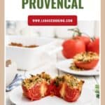 Halved baked tomatoes topped with herbed breadcrumbs on a white plate, with fresh tomatoes in the background.