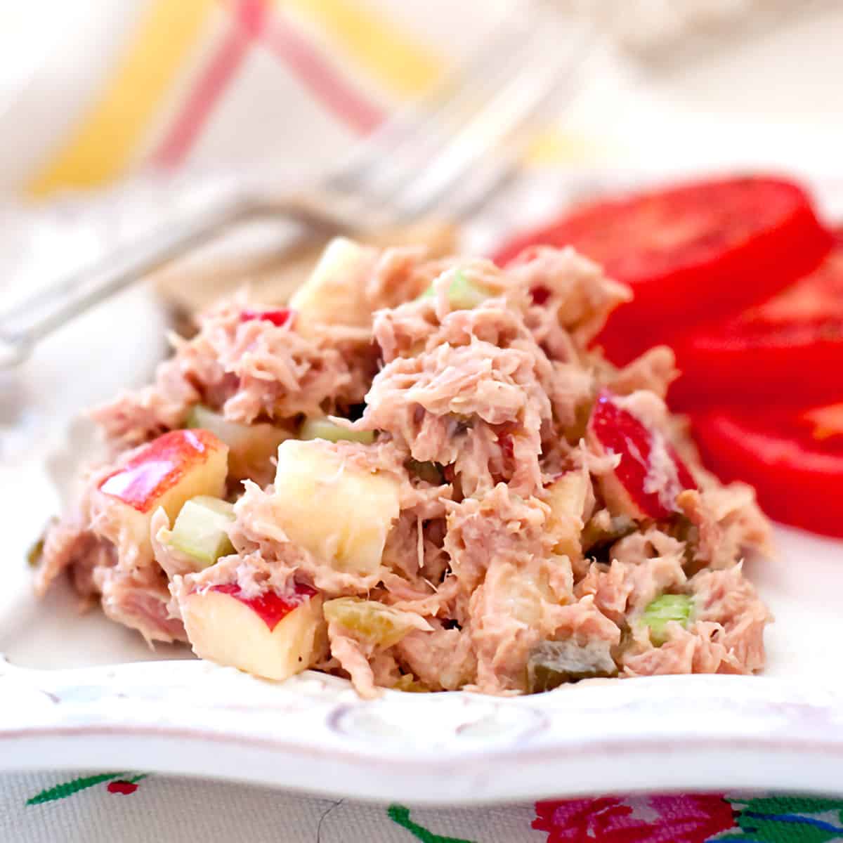 Tuna salad on a white plate.