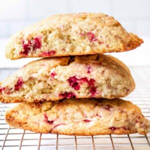 Three scones on a wire cooling rack.