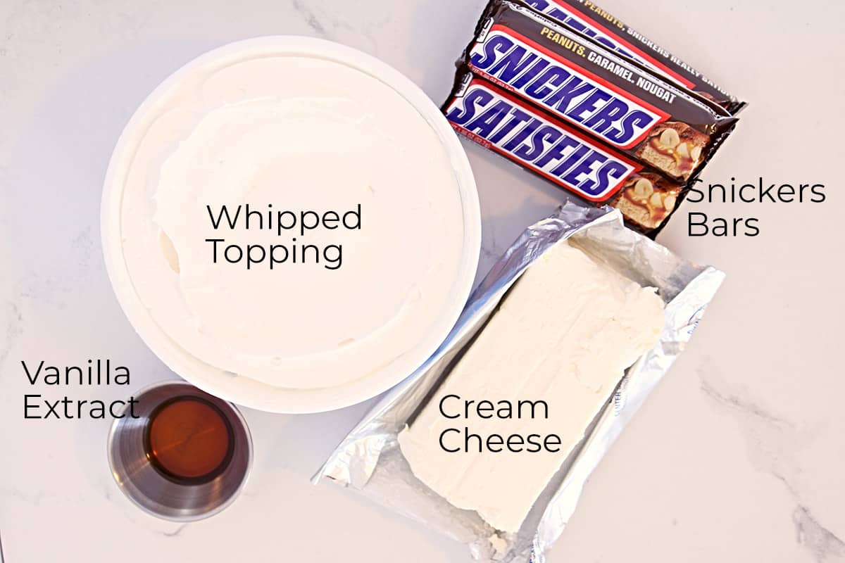 Ingredients needed to make Snickers dip.