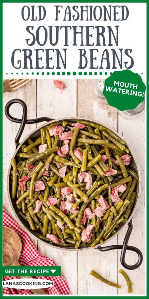 Green Beans with ham hocks in a serving dish on a tabletop. Text overlay for pinning.