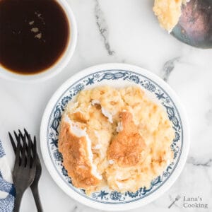 A serving of biscuit pudding on a plate.