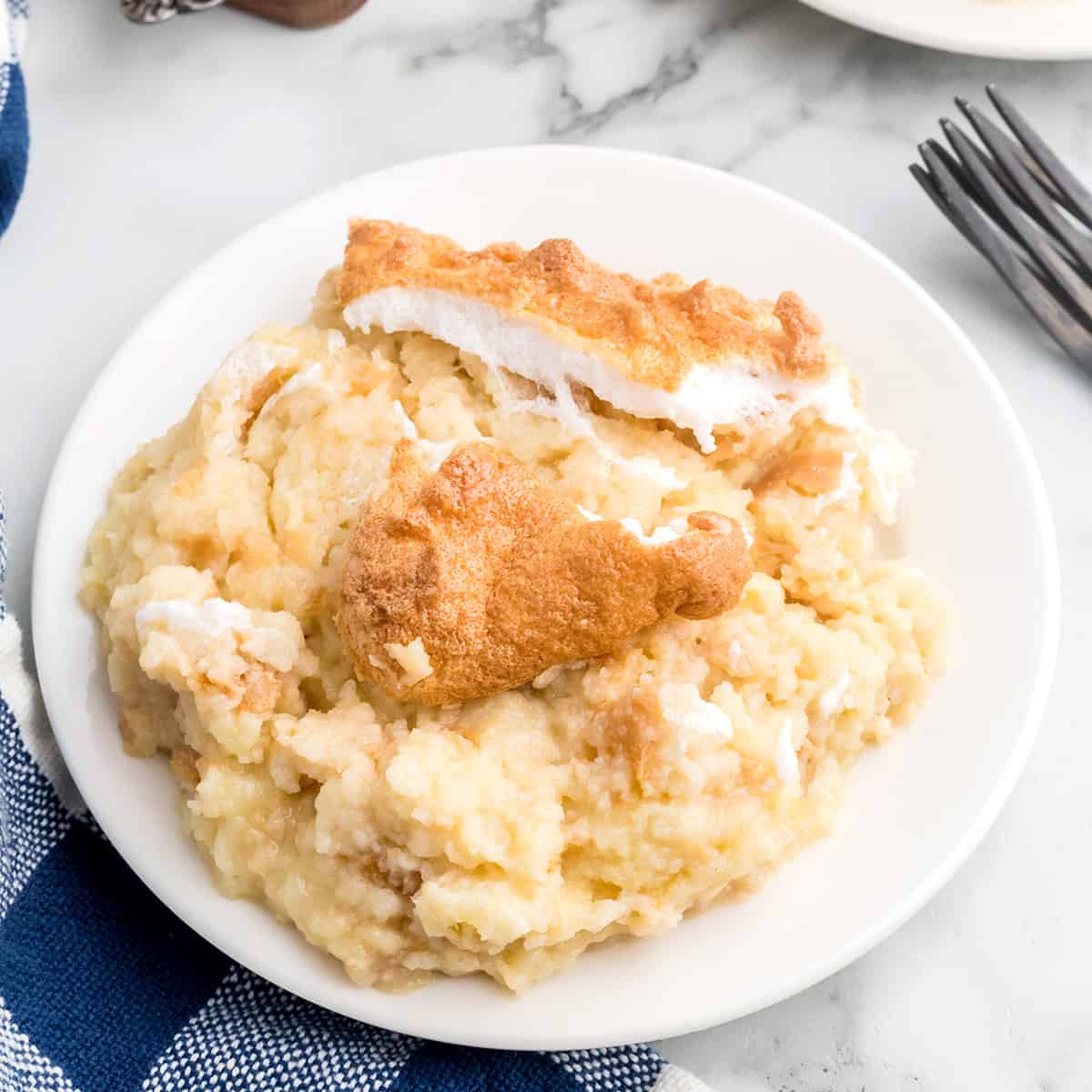 A serving of biscuit pudding on a plate.