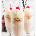 Three Coke floats in tall glasses with whipped cream and cherries, striped straws, and a Coke bottle in back.