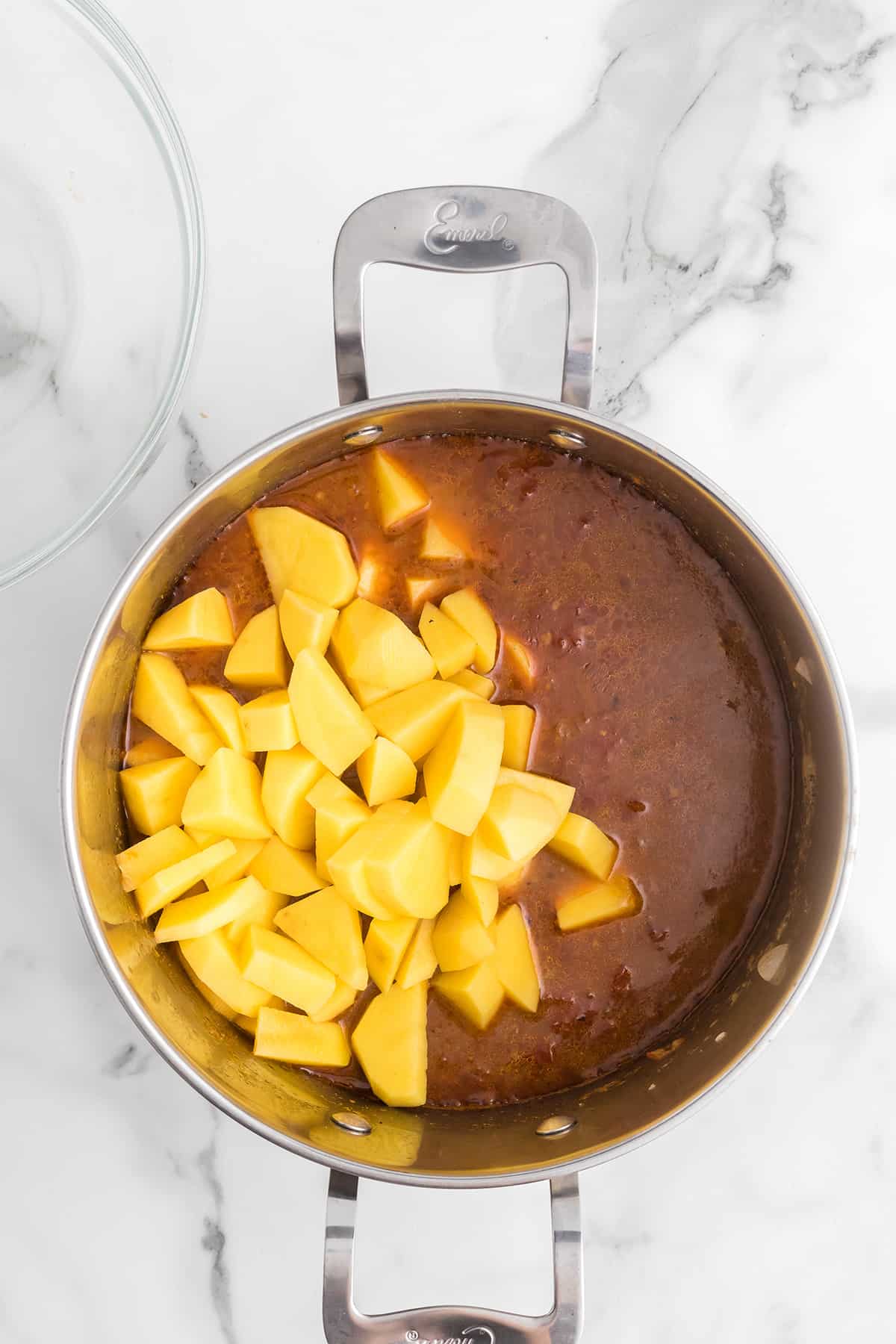 Potatoes added to Mexican beef stew.