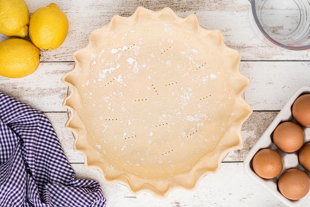 Pie crust fitted into a pie dish.