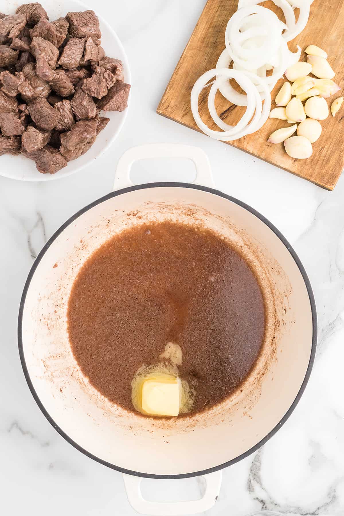 Butter added to cooking juices in the pan.