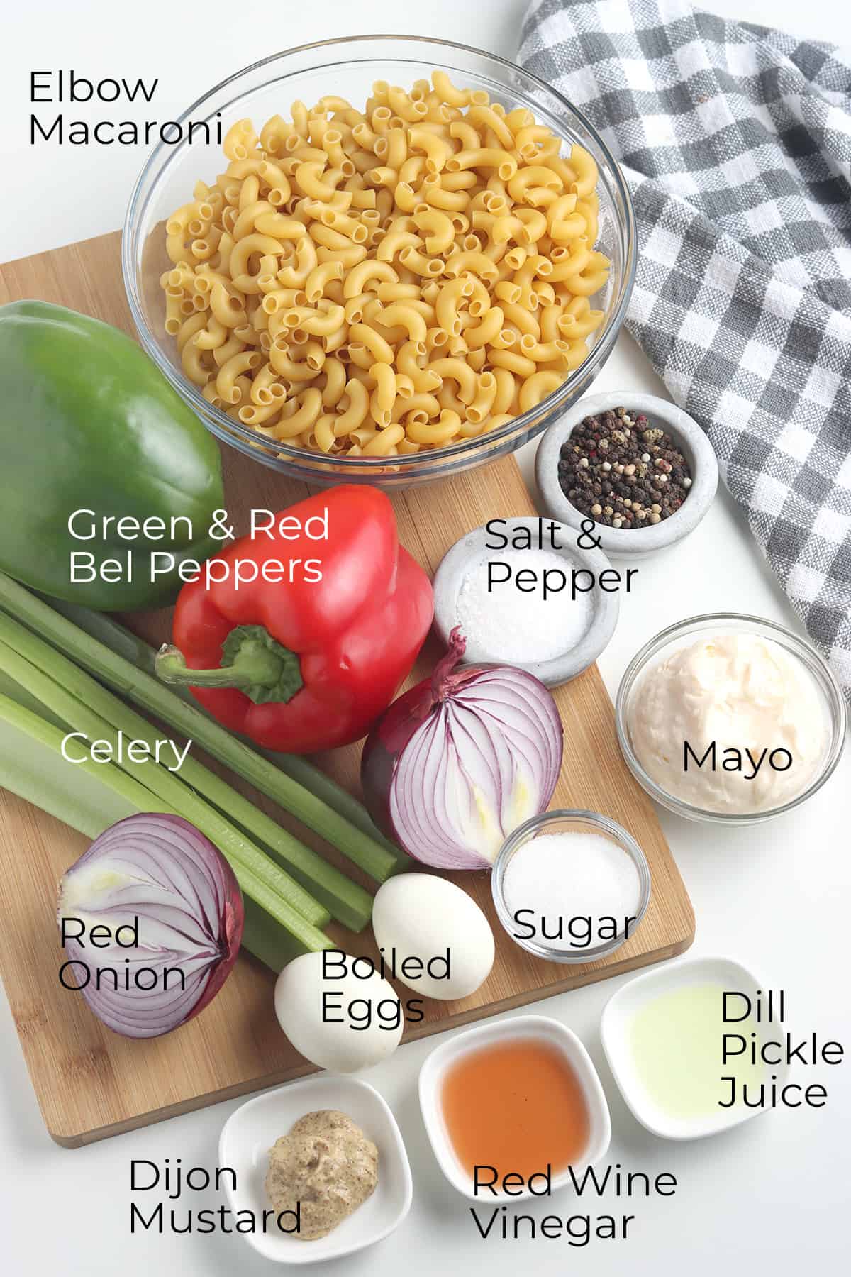 Ingredients needed to make classic macaroni salad.