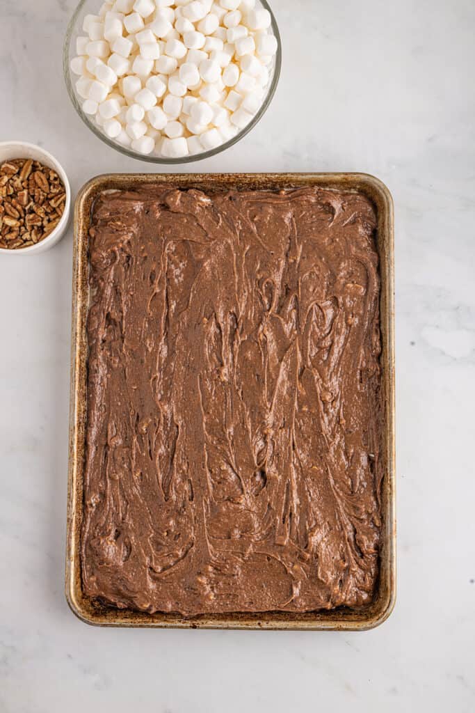 Cake batter in a baking pan.