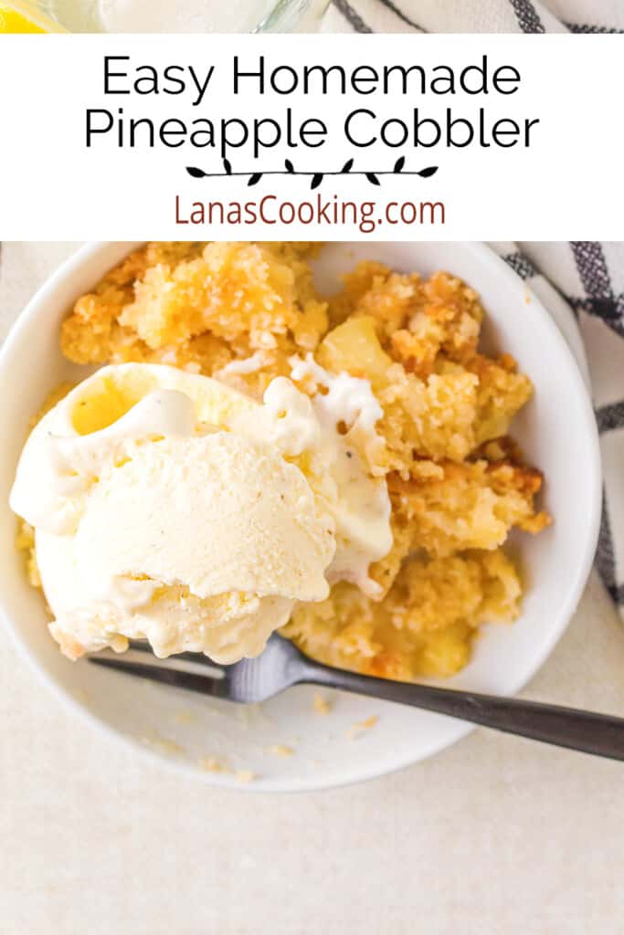 A serving of cobbler in a white bowl with vanilla ice cream on top.