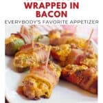 Bacon-wrapped jalapeno poppers stuffed with sausage and cheese, served on a white plate with toothpicks.