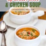 Two white bowls of Spanish rice and chicken soup, garnished with herbs, on white plates with spoons.