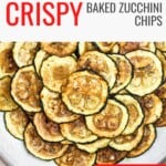 Finished zucchini chips on a white plate.