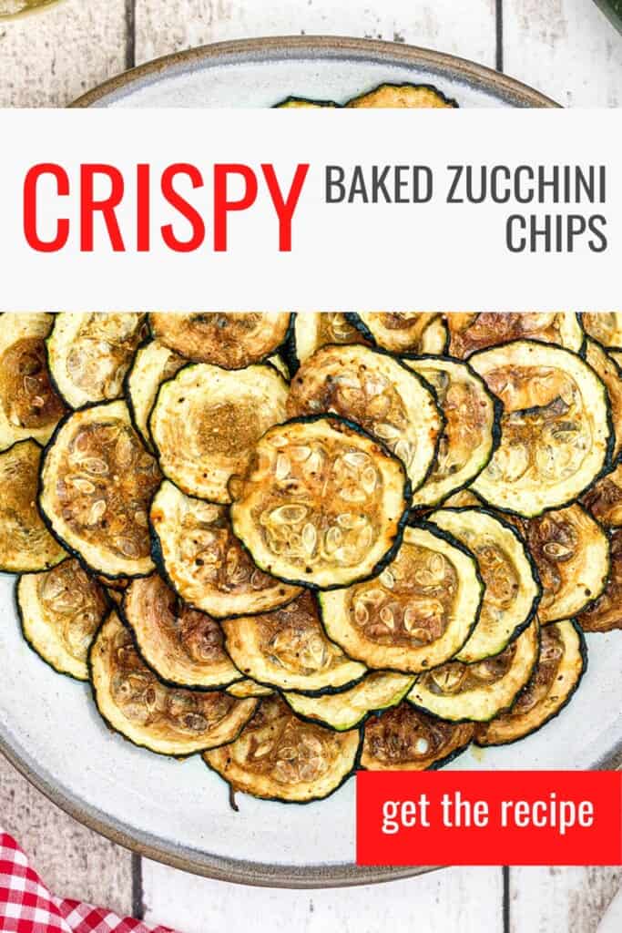 Finished zucchini chips on a white plate.