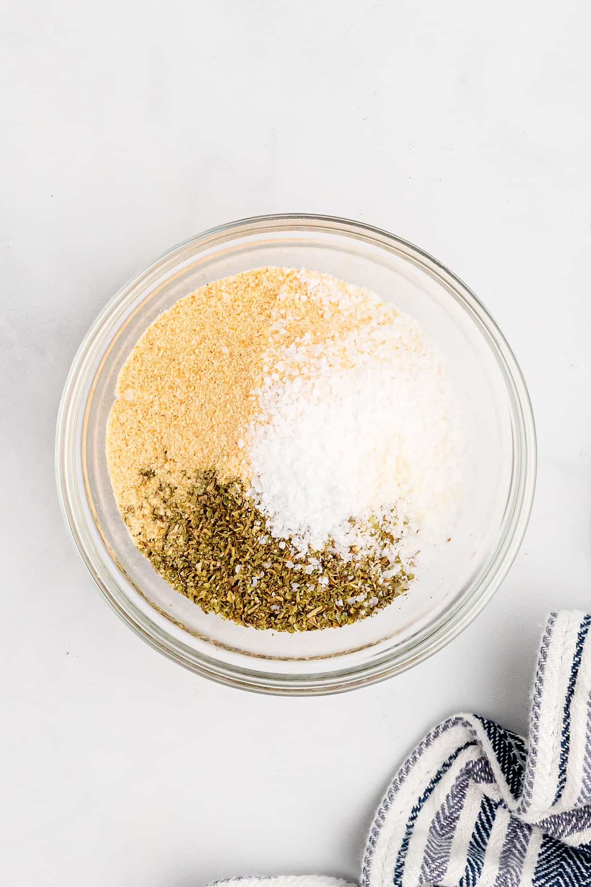 Parmesan and spices in a small bowl.