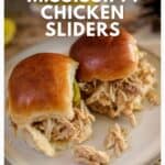 Two shredded chicken sliders on buns, served on a white plate with website text and recipe title above.