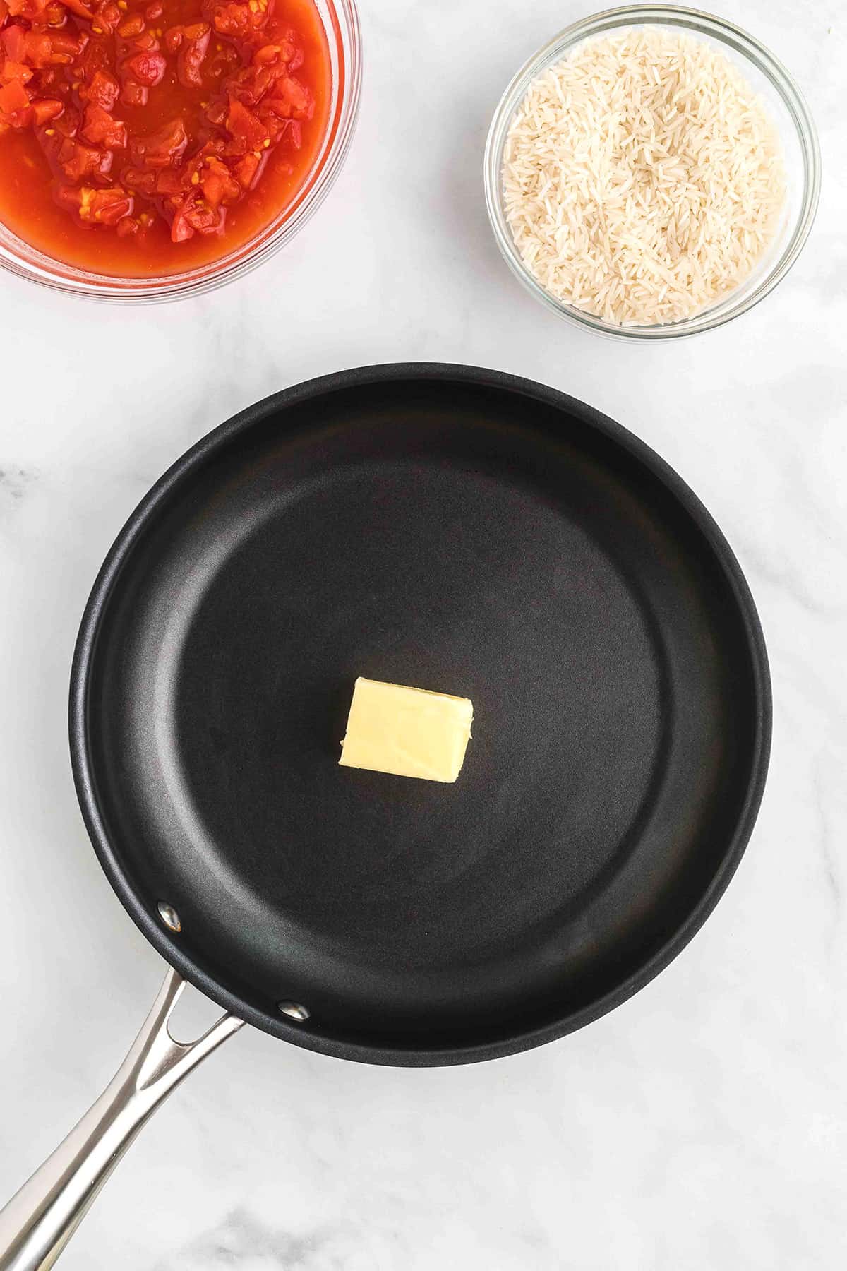 Butter melting in a skillet.