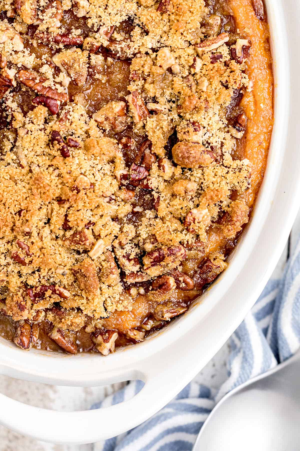 Sweet potato casserole in a white baking dish.